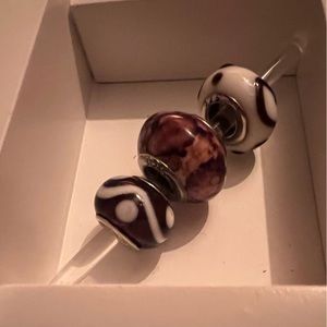 3 Brown pandora like beads